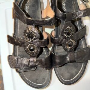 Abeo Black Strappy Sandals with Decorative Medallions
Sold as is